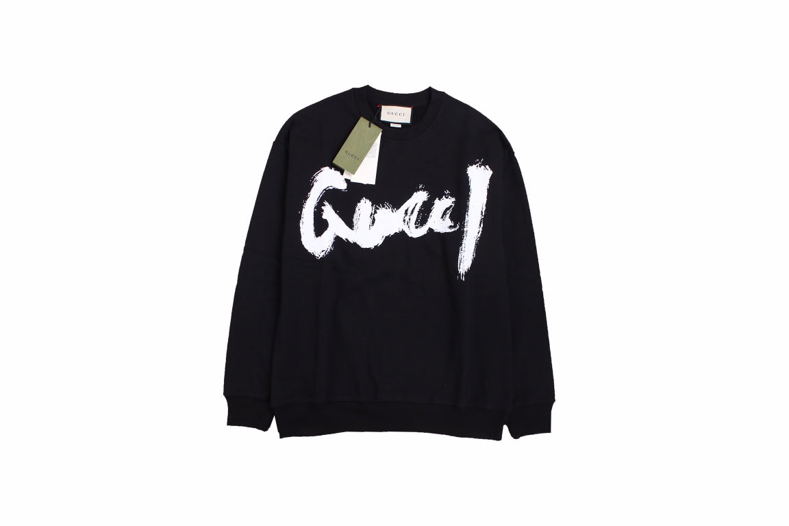 Gucci Sweatshirt - Black Unisex Streetwear Limited Edition - Black sweatshirt with a bold, brushstroke-style 'Gucci' logo in white. Features ribbed cuffs and hem