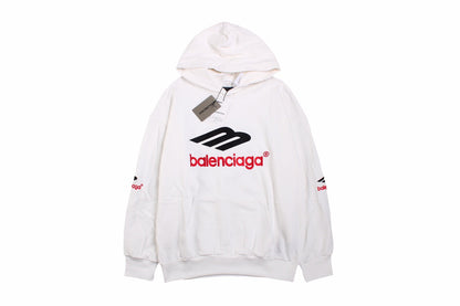 Balenciaga Hoodie - White Unisex Streetwear Limited Edition - This Balenciaga hoodie features a bold black and red logo on the front. Crafted from