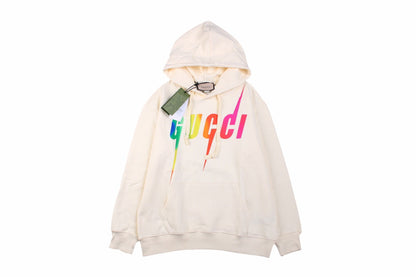 Gucci Rainbow Logo Hoodie - - Cream Unisex Streetwear Limited Edition - This cream-colored Gucci hoodie features a striking rainbow 'GUCCI' logo on the front. It has