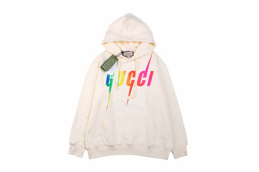 Gucci Rainbow Logo Hoodie - - Cream Unisex Streetwear Limited Edition - This cream-colored Gucci hoodie features a striking rainbow 'GUCCI' logo on the front. It has
