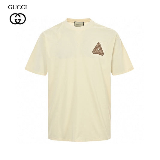 Gucci Triangle Logo T-shirt - Beige Unisex Streetwear Limited Edition - This Gucci t-shirt features a subtle triangle logo on the chest. The shirt is primarily