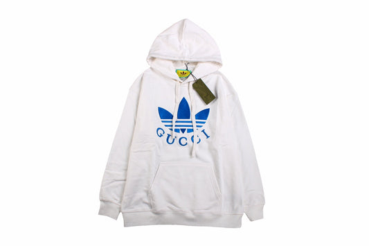 Gucci - Adidas Hoodie - White Unisex Streetwear Limited Edition - This Gucci x Adidas hoodie is crafted in white fabric, featuring the iconic blue Adidas