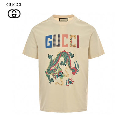 Gucci Dragon Graphic T-shirt (beige) Unisex Streetwear Limited Edition - This beige Gucci T-shirt stands out with its bold dragon graphic design. The top features