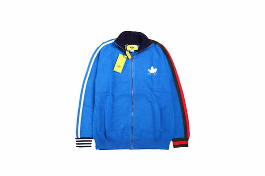 Gucci - Adidas Track Jacket - Blue Unisex Streetwear Limited Edition - This Gucci x Adidas track jacket comes in a vibrant blue color. It features a