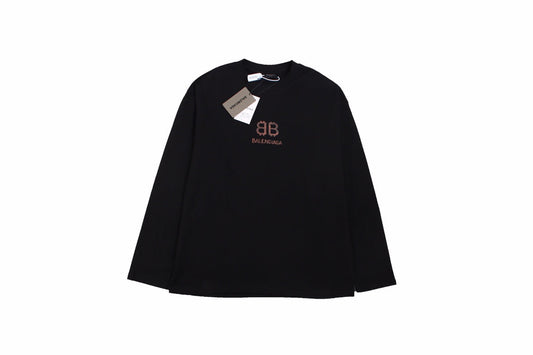 Balenciaga Long Sleeve T-shirt - Black Unisex Streetwear Limited Edition - Black long sleeve t-shirt with brown Balenciaga logo on the chest. Simple and minimalist design.