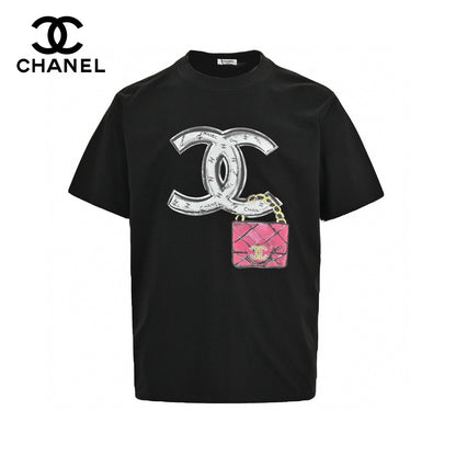 Chanel T-shirt - Black Unisex Streetwear Limited Edition - This Chanel t-shirt features a large, iconic double C logo graphic on the front. The
