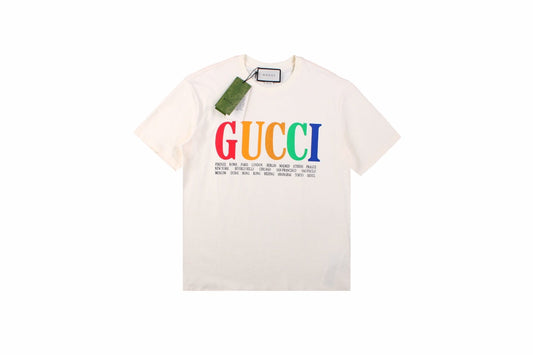 Gucci Cities Block Letter T-shirt - - White Unisex Streetwear Limited Edition - This white Gucci t-shirt proudly displays the 'GUCCI' logo in bold, colorful block letters across
