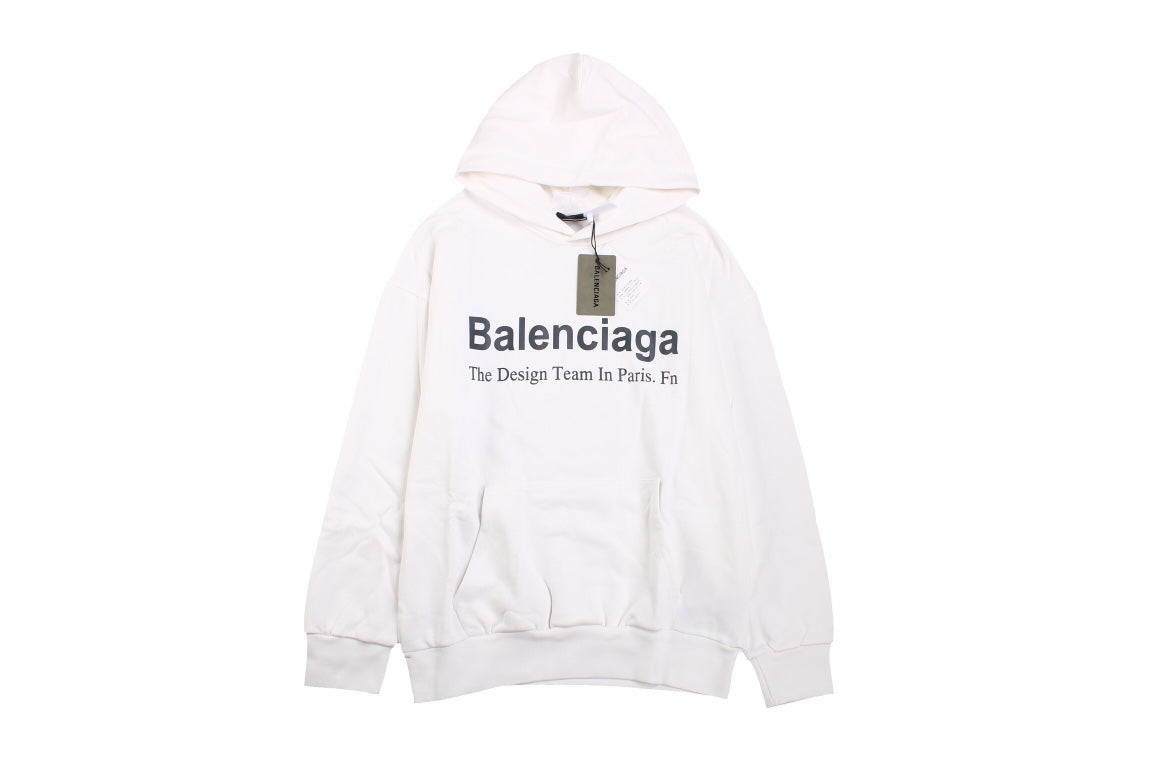 Balenciaga Paris Team Hoodie - White Unisex Streetwear Limited Edition - This Balenciaga hoodie in white features the text 'Balenciaga The Design Team In Paris. Fn'