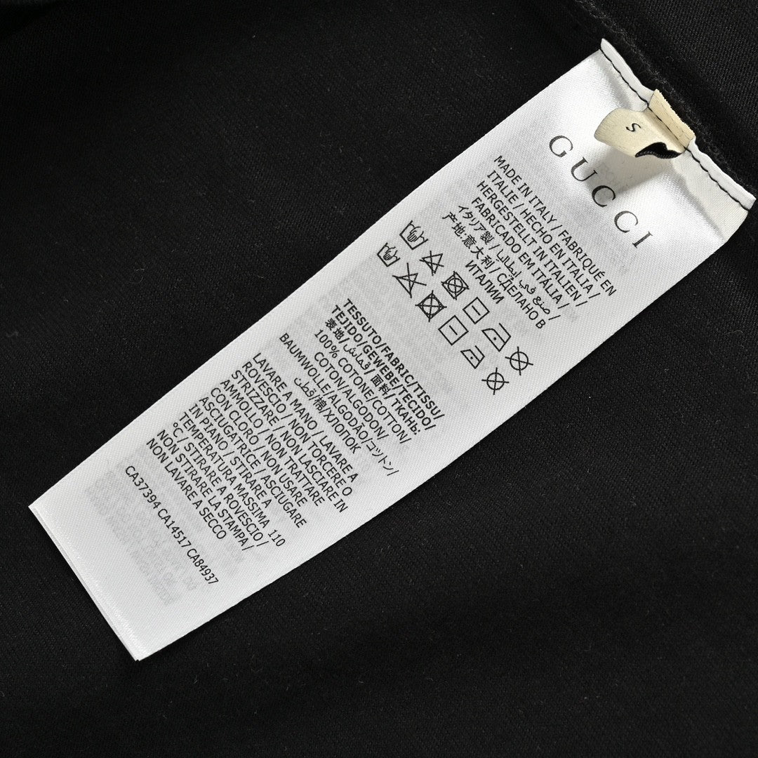 Gucci T-shirt With Dinosaur Graphic - Black Unisex Streetwear Limited Edition - <span>Fun and trendy. Features colorful dinosaur cartoons. Gucci logo in the center. Made from high-quality