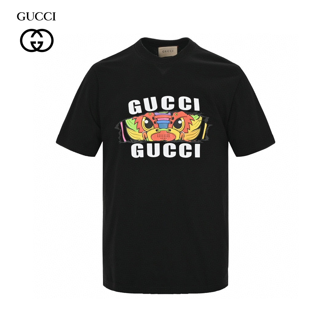 Gucci Graphic T-shirt (black) Unisex Streetwear Limited Edition - <span>This black Gucci t-shirt features a striking and colorful graphic design. The vibrant artwork showcases
