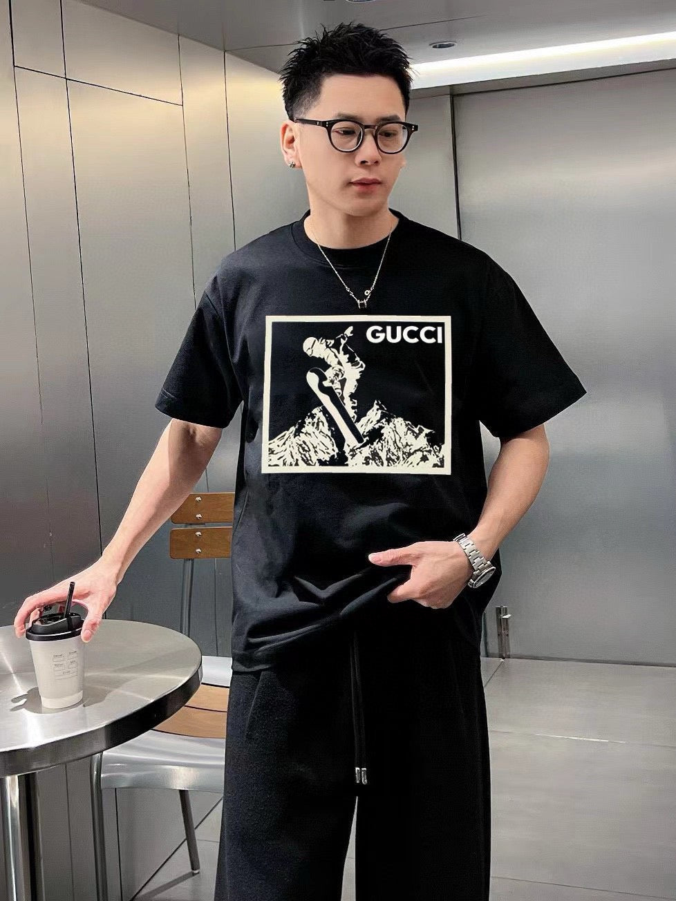 Gucci Snowboarder Graphic T-shirt - Black Unisex Streetwear Limited Edition - <span>This Gucci t-shirt features a bold graphic design of a snowboarder in action against a