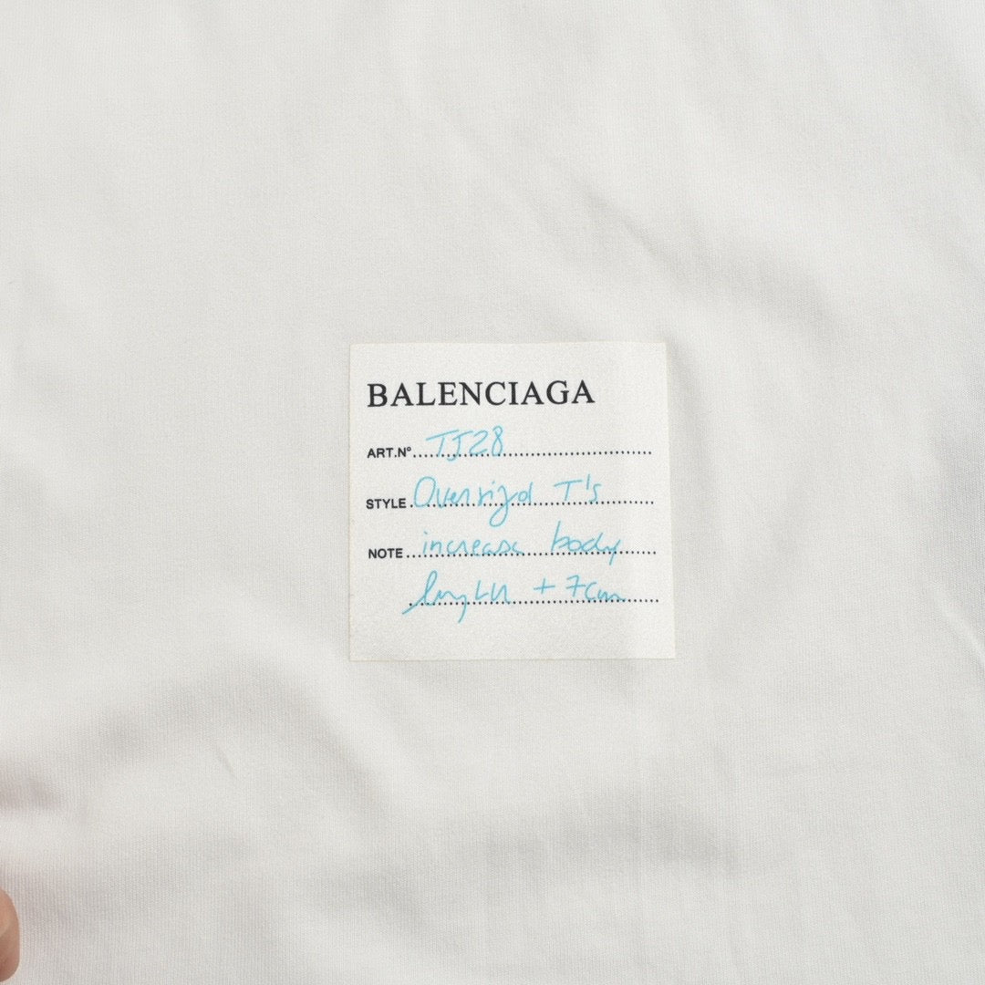 Balenciaga T-shirt With Label Detail - White Unisex Streetwear Limited Edition - <span>Minimalist design. Features a small label detail at the bottom. Made from premium fabric for