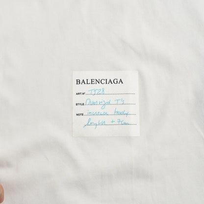 Balenciaga T-shirt With Label Detail - White Unisex Streetwear Limited Edition - <span>Minimalist design. Features a small label detail at the bottom. Made from premium fabric for
