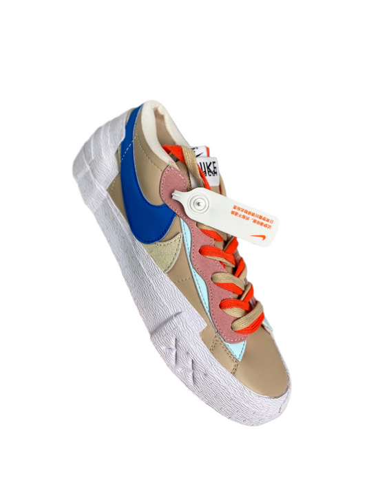 KAWS - Sacai - Nike Blazer Reed - Red Unisex Streetwear Limited Edition - The KAWS x Sacai x Nike Blazer 'Reed' brings together three creative powerhouses to deliver