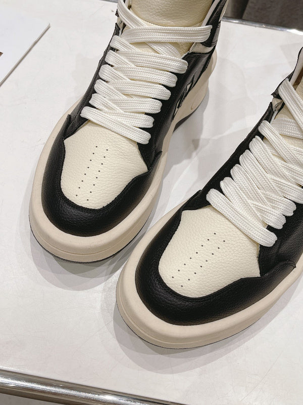 Rick Owens High-top Sneakers - Black Unisex Streetwear Limited Edition - **Rick Owens High-Top Sneakers: Dual-Tone Elegance and Craftsmanship** Step up your fashion game with Rick