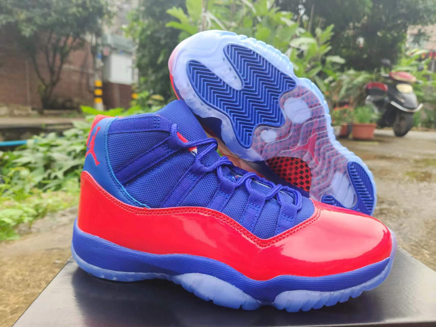JORDAN 11 Blue And Sneakers - Red Unisex Streetwear Limited Edition - The Air Jordan 11 shown in the image features a bold and eye-catching colorway that