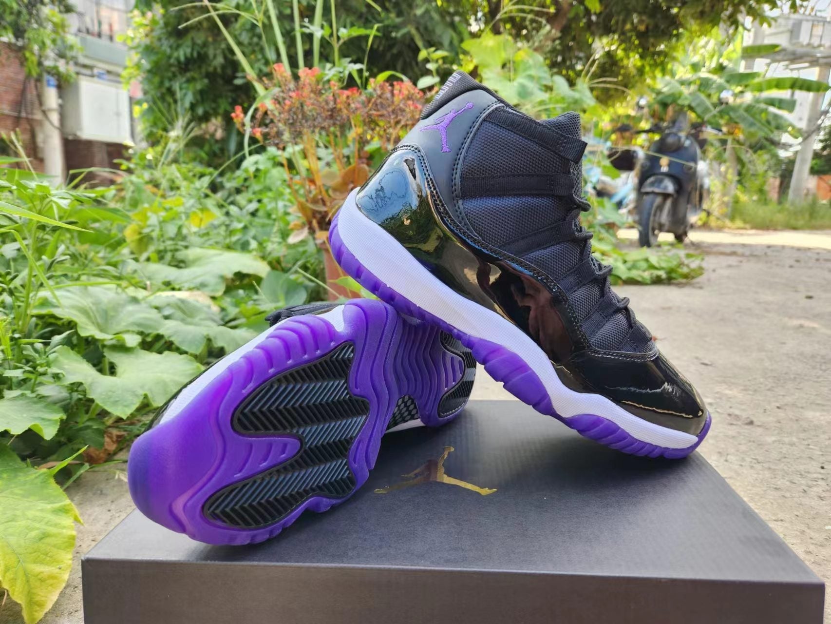 JORDAN 11 And Purple - Black Unisex Streetwear Limited Edition - The Air Jordan 11 in Black and Concord Purple is a bold and dynamic rendition