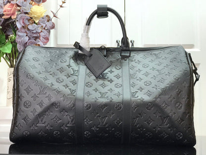 LOUIS VUITTON KEEPBALL 50 BLACK LEATHER TRAVEL BAG - front view - replica sneakers