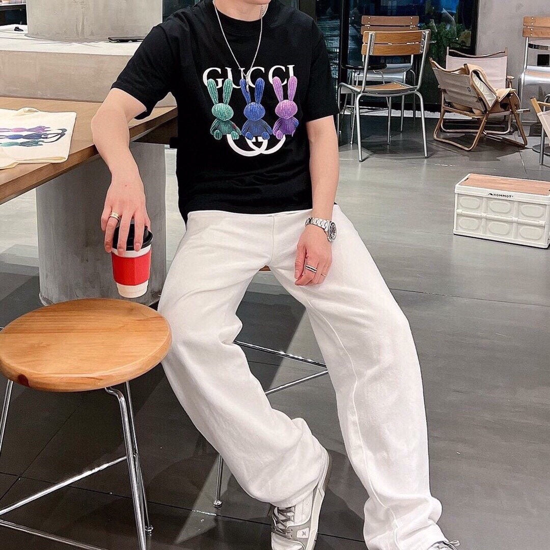 Gucci Bunny Trio T-shirt (black) Unisex Streetwear Limited Edition - This Gucci t-shirt features a playful design with three colorful bunnies. The bunnies are displayed