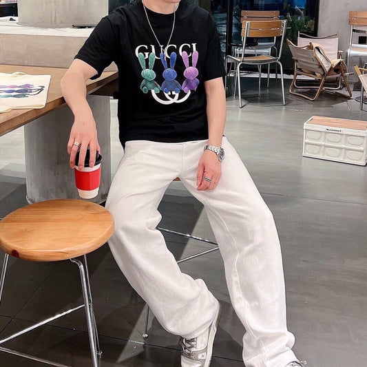 Gucci Bunny Trio T-shirt (black) Unisex Streetwear Limited Edition - This Gucci t-shirt features a playful design with three colorful bunnies. The bunnies are displayed