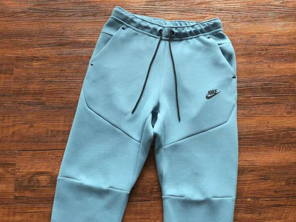 NIKE Tech Fleece Pants - Baby - Blue Unisex Streetwear Limited Edition - The NIKE TECH FLEECE PANTS BABY BLUE - REPLICA combine modern athletic innovation with sleek