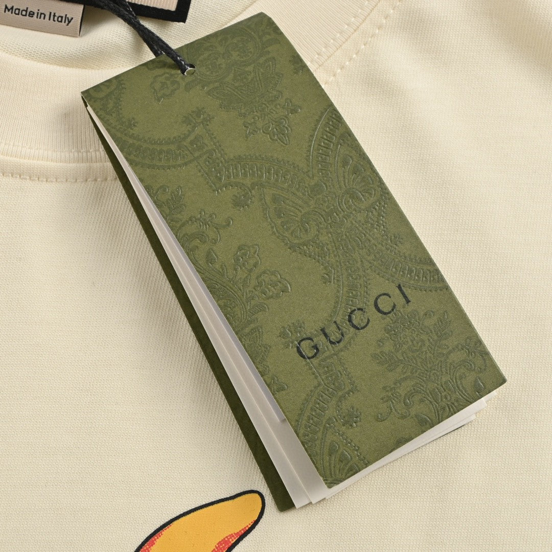 Camiseta Gucci color crema con dibujo de dragón