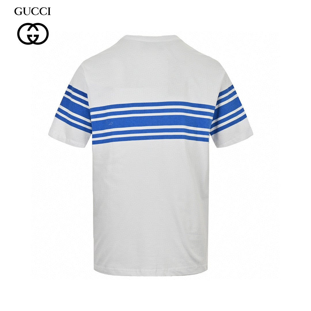 Gucci Gg Blue Stripe T-shirt - White Unisex Streetwear Limited Edition - This Gucci t-shirt features a stylish blue stripe design across the chest and sleeves, accented