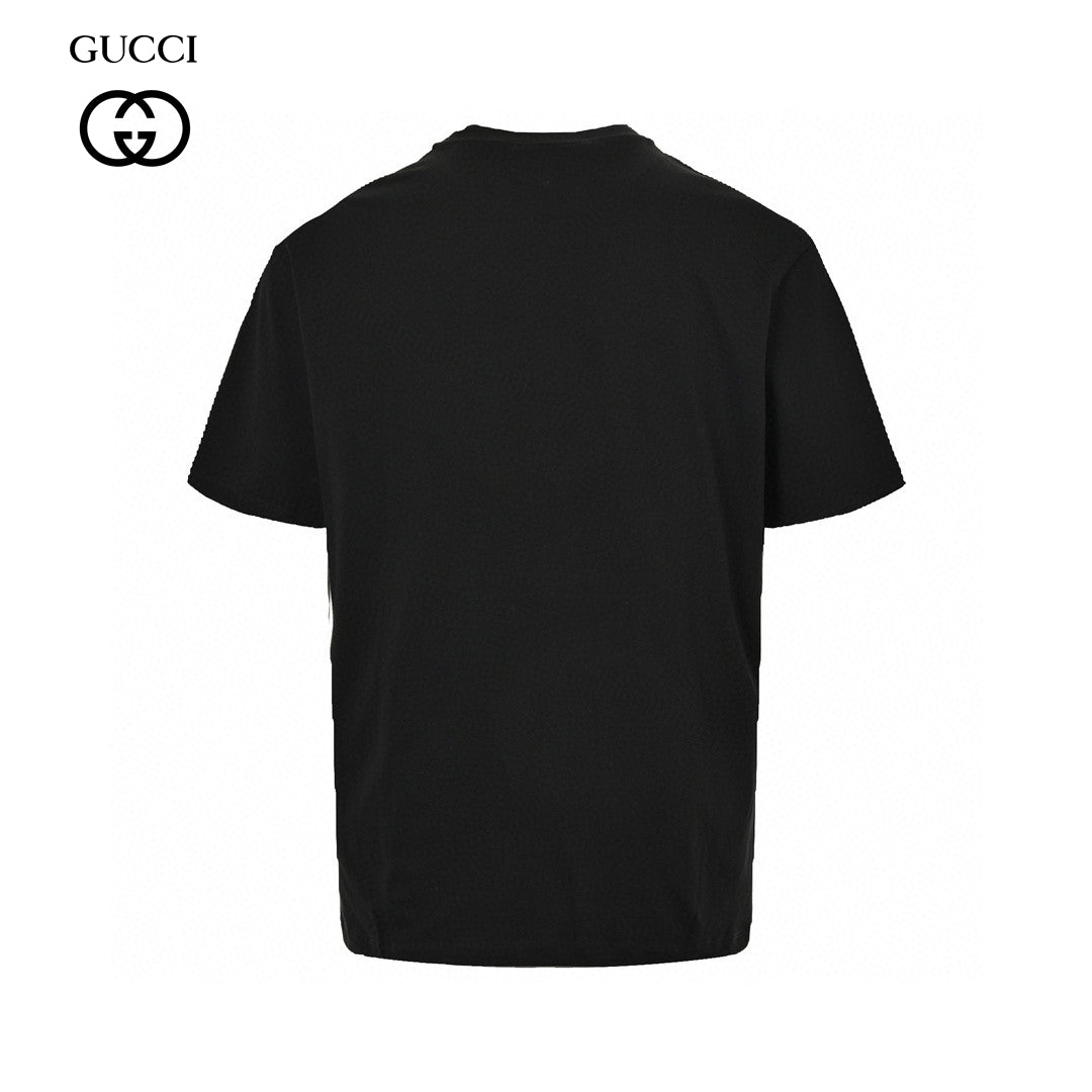 Gucci T-shirt - Black Unisex Streetwear Limited Edition - This Gucci t-shirt features a playful design with a small graphic of a cartoon face