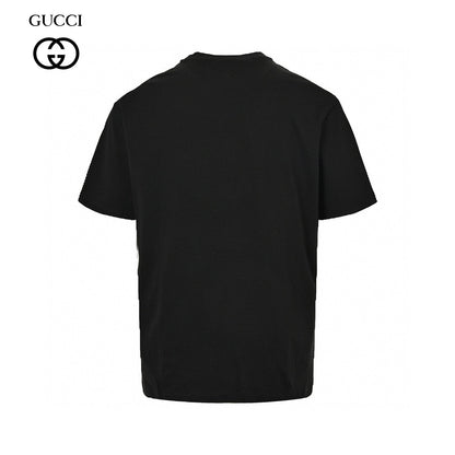 Gucci T-shirt - Black Unisex Streetwear Limited Edition - This Gucci t-shirt features a playful design with a small graphic of a cartoon face