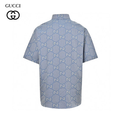Gucci Allover Logo Denim Shirt - Blue Unisex Streetwear Limited Edition - This Gucci shirt features an allover GG logo design set against a light blue denim