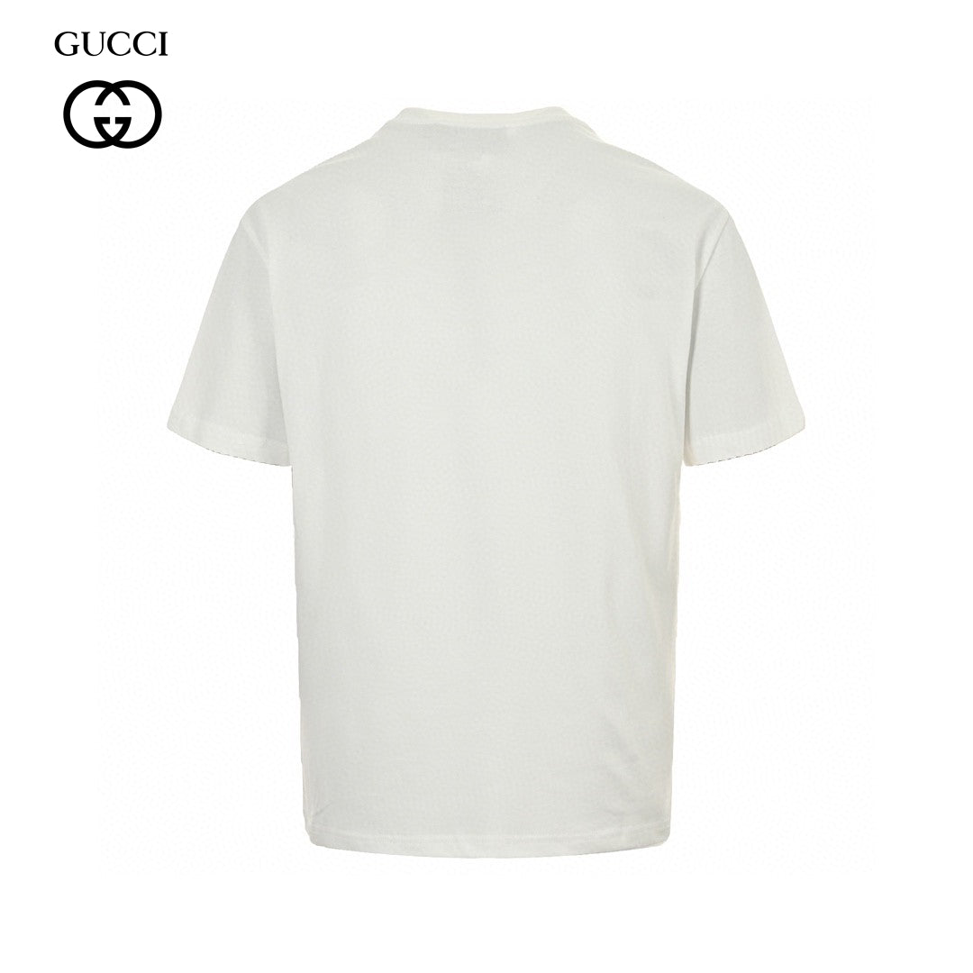 Gucci Embellished T-shirt - White Unisex Streetwear Limited Edition - This Gucci t-shirt features a stylish design with the Gucci logo and small black dot