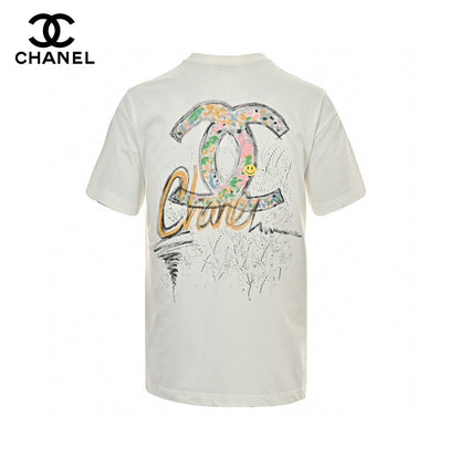 Chanel T-shirt - White Unisex Streetwear Limited Edition - This Chanel t-shirt features a minimalist white design. It has a subtle graphic on the