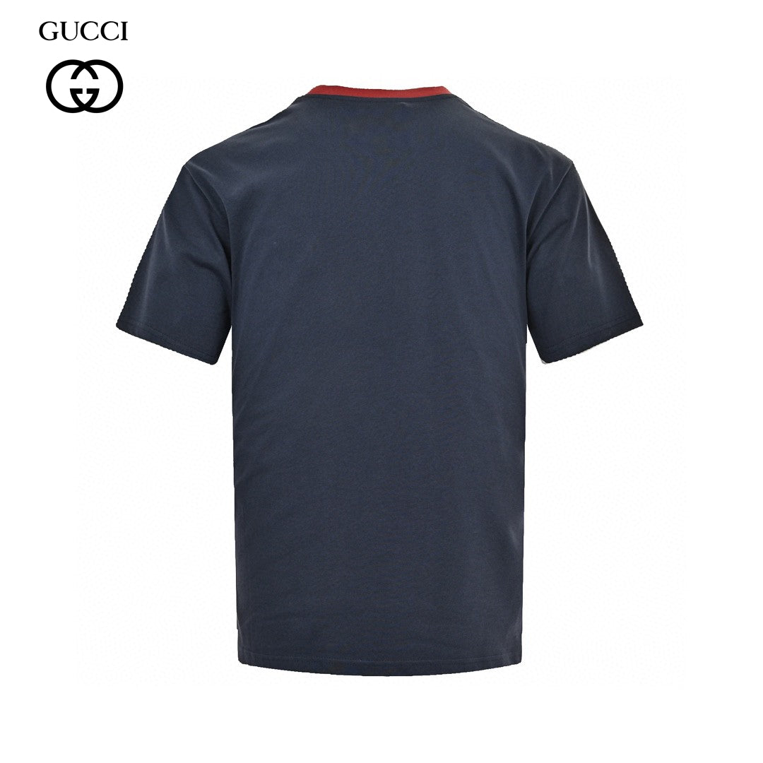 Gucci Cherry Logo T-shirt - Navy Unisex Streetwear Limited Edition - This Gucci t-shirt in navy features a small, playful cherry graphic intertwined with the iconic