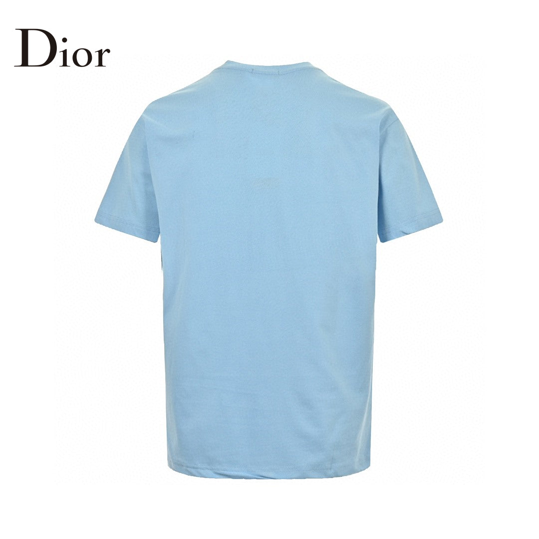 Dior Christian Dior Couture Light T-shirt - Blue Unisex Streetwear Limited Edition - This Dior t-shirt features a minimalist design with 'Christian Dior Couture' text in orange on