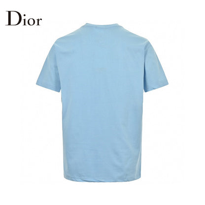 Dior Christian Dior Couture Light T-shirt - Blue Unisex Streetwear Limited Edition - This Dior t-shirt features a minimalist design with 'Christian Dior Couture' text in orange on