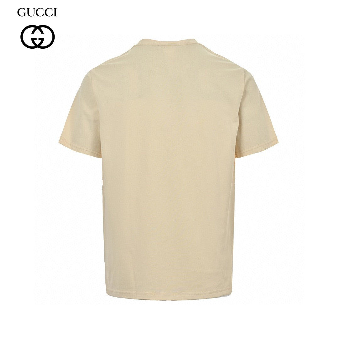 Gucci Splatter Logo T-shirt (beige) Unisex Streetwear Limited Edition - This beige Gucci T-shirt features a striking splatter logo design. The front showcases the iconic