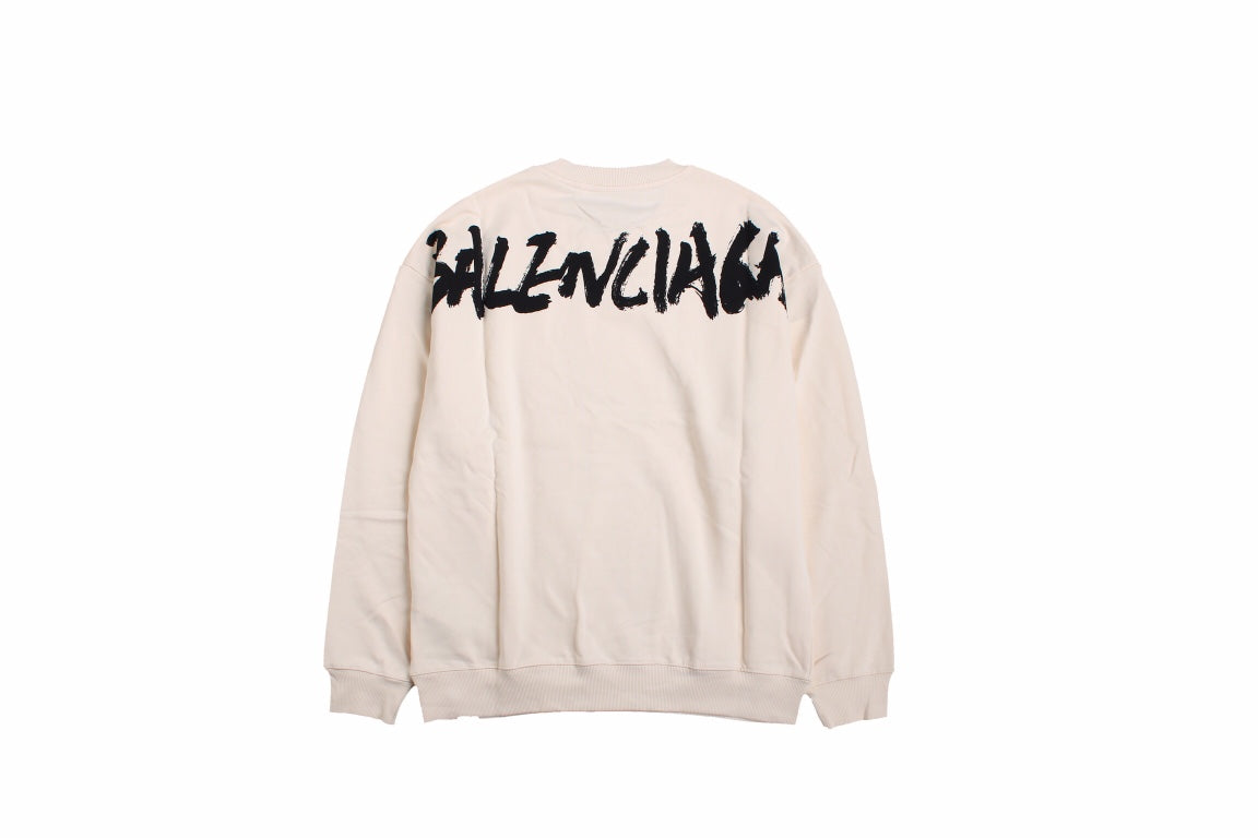 Gucci Sweatshirt - Black Unisex Streetwear Limited Edition - Cream-colored sweatshirt with a bold, brushstroke-style 'Gucci' logo in black. Features ribbed cuffs and hem