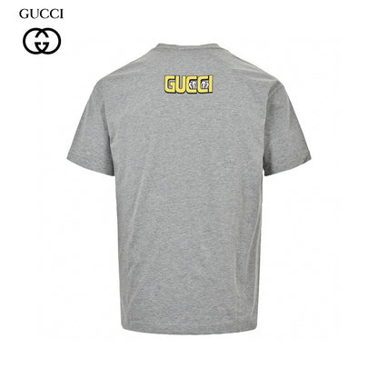 Gucci Cartoon Graphic T-shirt (grey) Unisex Streetwear Limited Edition - This grey Gucci T-shirt features a playful and vibrant cartoon graphic design. The front showcases