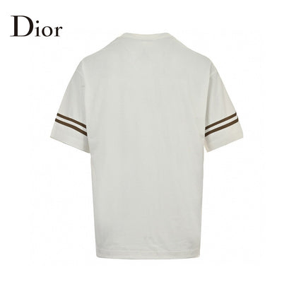 Dior And Brown T-shirt - White Unisex Streetwear Limited Edition - This Dior t-shirt features a bold graphic design with 'Dior' text prominently displayed. The white