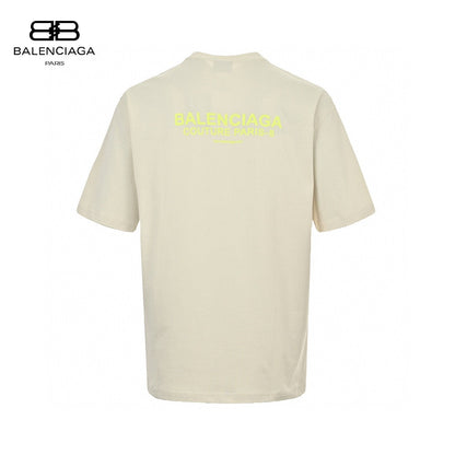 Balenciaga T-shirt - Yellow Unisex Streetwear Limited Edition - This Balenciaga t-shirt features a minimalist cream design. The front is adorned with the Balenciaga