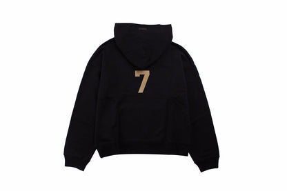 Fear Of God Hoodie - Black Unisex Streetwear Limited Edition - Black hoodie with tan '7' print on the chest. Comfortable and cozy fit. Features a