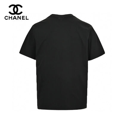 Chanel T-shirt - Black Unisex Streetwear Limited Edition - This Chanel t-shirt features a large, iconic double C logo graphic on the front. The