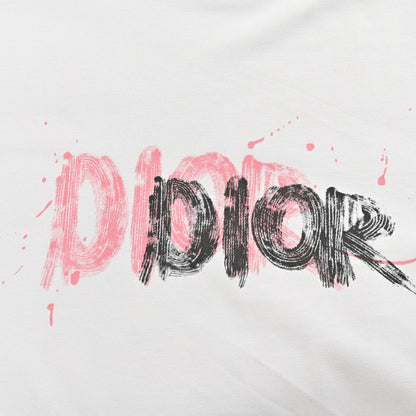 Dior T-shirt - Paint Stroke Logo - Black Unisex Streetwear Limited Edition - <span>This Dior t-shirt features a bold design with the Dior logo in a paint stroke
