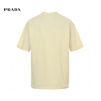Prada T-shirt - With Bold Branding - Cream Unisex Streetwear Limited Edition - <span>This Prada t-shirt features a cream base with bold 'PRADA MILANO' branding across the chest.