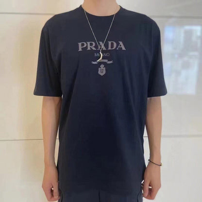 Prada T-shirt - With Subtle Branding - Black Unisex Streetwear Limited Edition - <span>This Prada t-shirt features a sleek black base with understated 'PRADA MILANO' branding across the