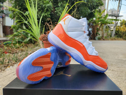 JORDAN 11 Orange And - White Unisex Streetwear Limited Edition - The Air Jordan 11 in White, Orange, and Red is a striking addition to the