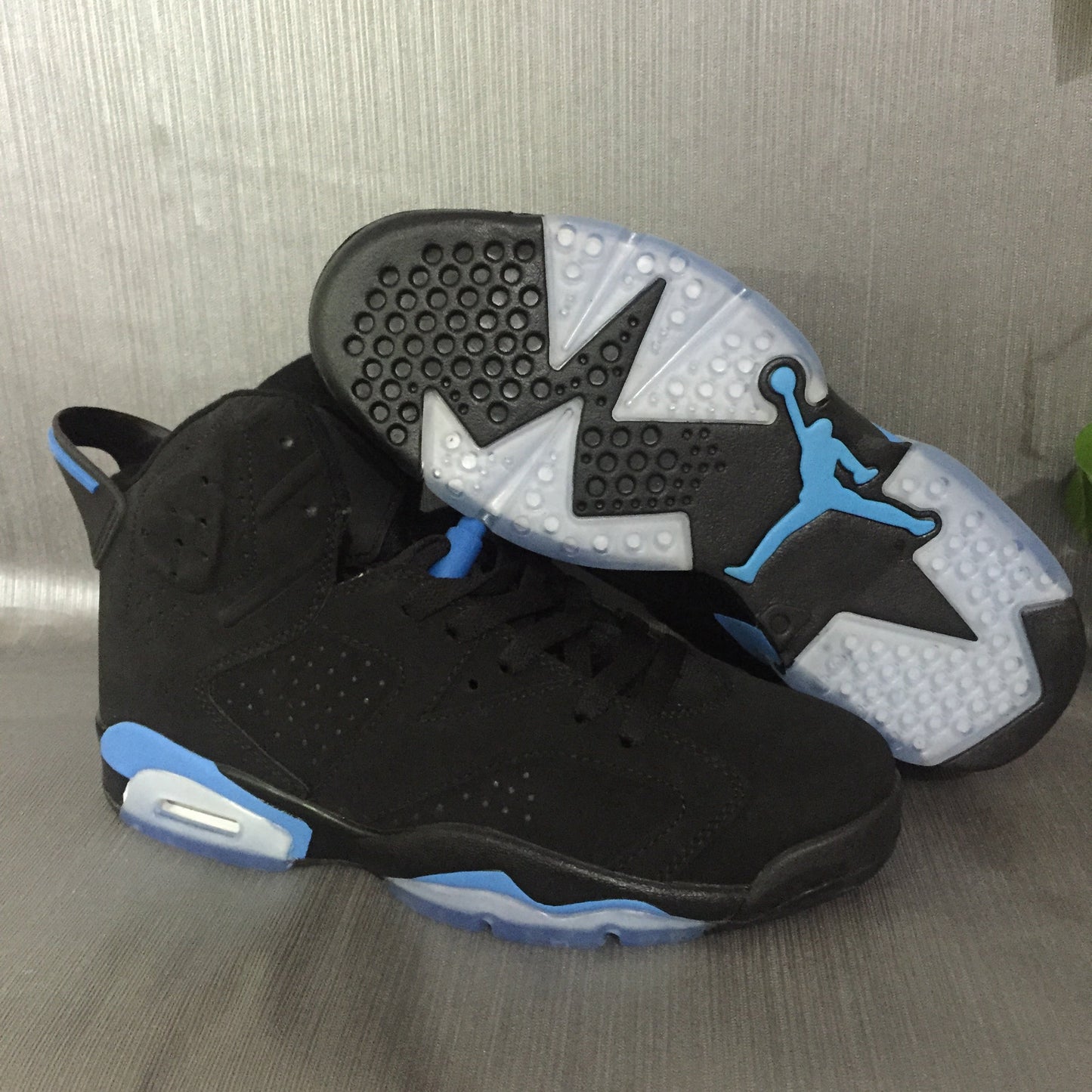 Jordan 6 Retro 'black University Blue' Unisex Streetwear Limited Edition - Introducing the Air Jordan 6 Retro 'Black University Blue,' a sneaker that masterfully blends classic