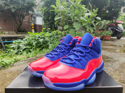 JORDAN 11 Blue And Sneakers - Red Unisex Streetwear Limited Edition - The Air Jordan 11 shown in the image features a bold and eye-catching colorway that
