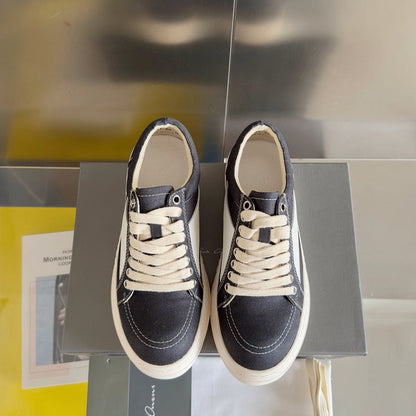 Rick Owens Canvas Low-top Sneakers - Black Unisex Streetwear Limited Edition - **Rick Owens Black Canvas Low-Top Sneakers: Modern Minimalism and Superior Craftsmanship** Introducing the Rick Owens