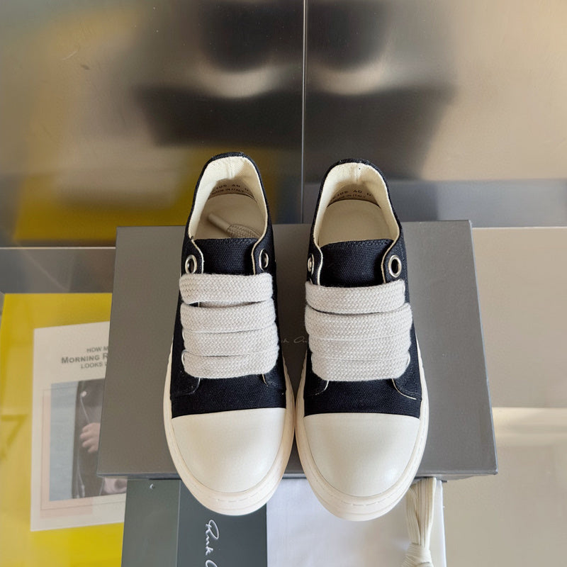 Rick Owens Canvas Low-top Sneakers - Black Unisex Streetwear Limited Edition - **Rick Owens Black Canvas Low-Top Sneakers: Modern Minimalism with Superior Craftsmanship** Introducing the Rick Owens